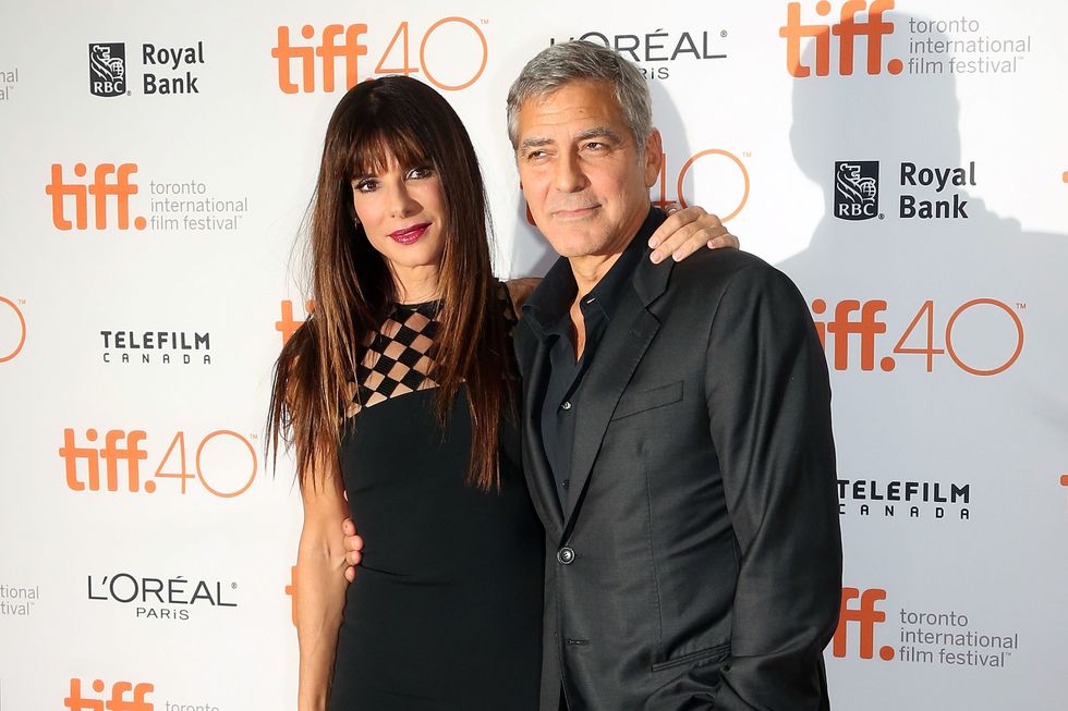 TORONTO, ON - SEPTEMBER 11:  George Clooney and Sandra Bullock attend the premiere of "Our Brand is Crisis" at the Princess of Wales Theatre during the 2015 Toronto International Film Festival on September 11, 2015 in Toronto, Canada.  (Photo by Taylor Hill/FilmMagic)