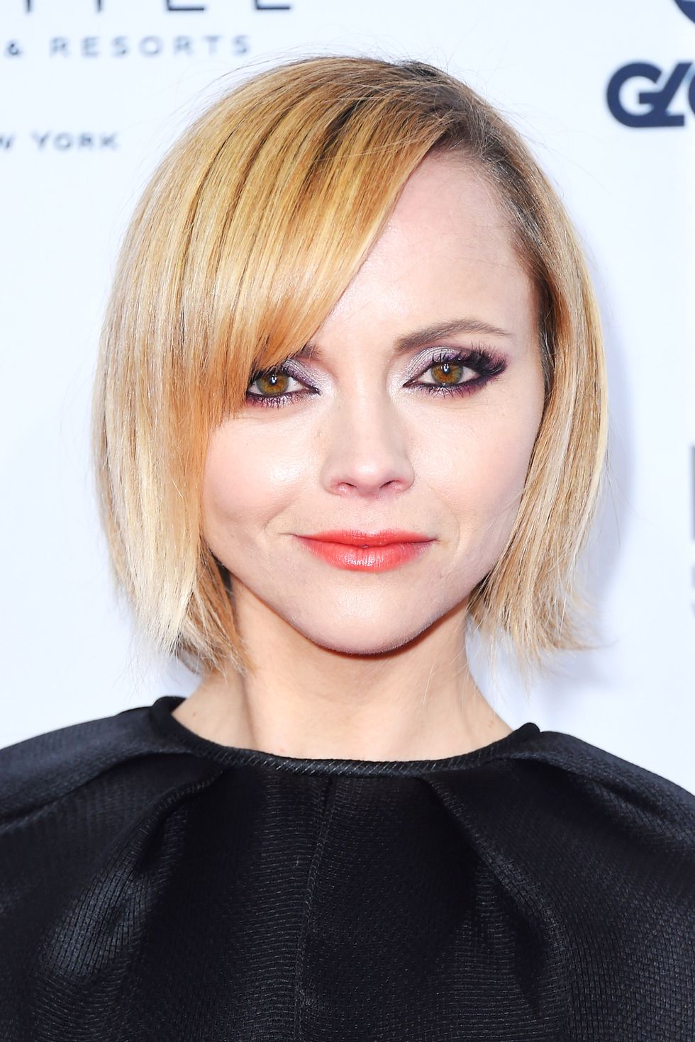 <p>To balance out a round face shape like Ricci's, who has a larger forehead, side bangs and a short bob is the ticket to elongating your look. </p>