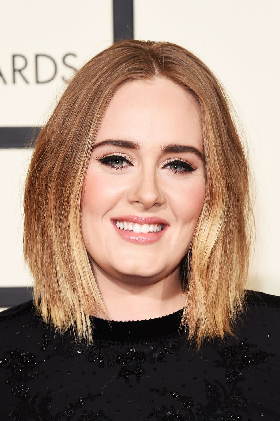 <p>Many round-faced celebs wear their hair with a middle part,  because it helps elongate your face. Adele wears hers in a blunt bob, and the kinks in her style work to accentuate her cheekbones. </p>