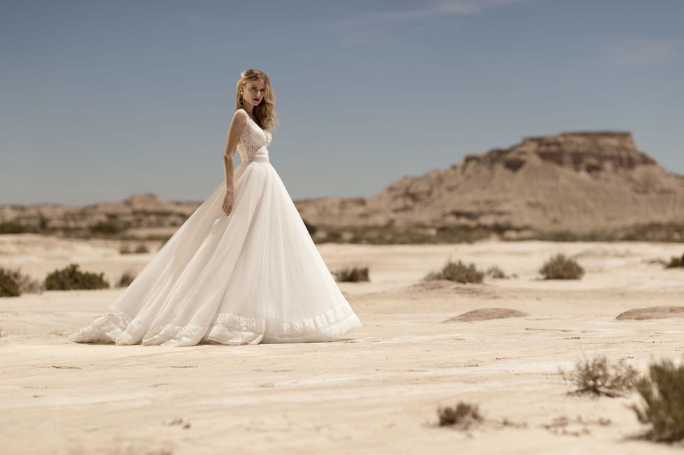 Wedding dress, Photograph, Gown, Dress, Bride, Clothing, Bridal clothing, Natural environment, Beauty, Landscape, 