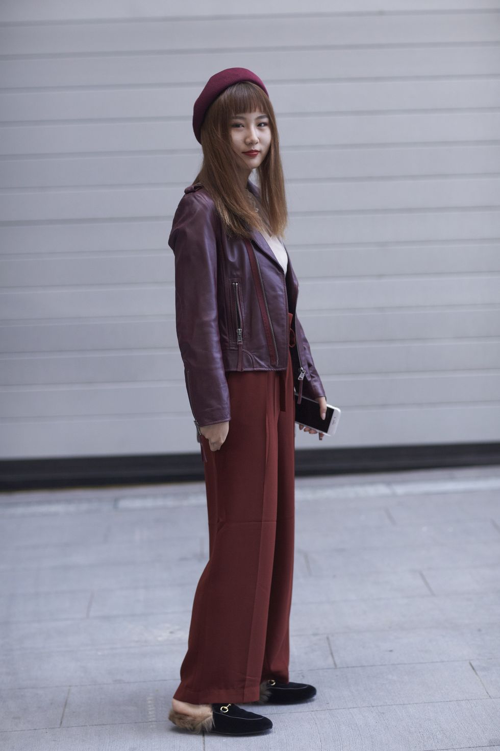 Clothing, Maroon, Brown, Street fashion, Fashion, Outerwear, Standing, Headgear, Trousers, Costume, 