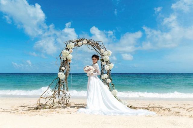 Photograph, Bride, Arch, Sky, Wedding dress, Dress, Wedding, Honeymoon, Gown, Ceremony, 