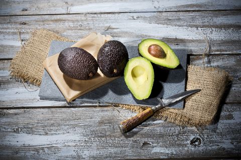 Food, Avocado, Superfood, Fruit, Still life photography, Ingredient, Wood, Cutting board, Plant, Produce, 