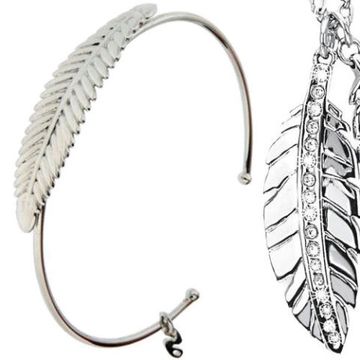 Fashion accessory, Body jewelry, Jewellery, Leaf, Feather, Earrings, Metal, Wing, 