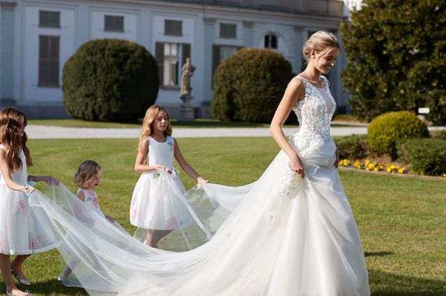 Gown, Dress, Wedding dress, Photograph, Clothing, Bride, Bridal clothing, Child, Bridal party dress, Shoulder, 