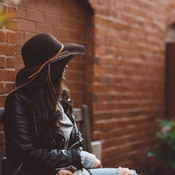 Wall, Human, Outerwear, Tree, Headgear, Brick, Jacket, Temple, Window, Photography, 