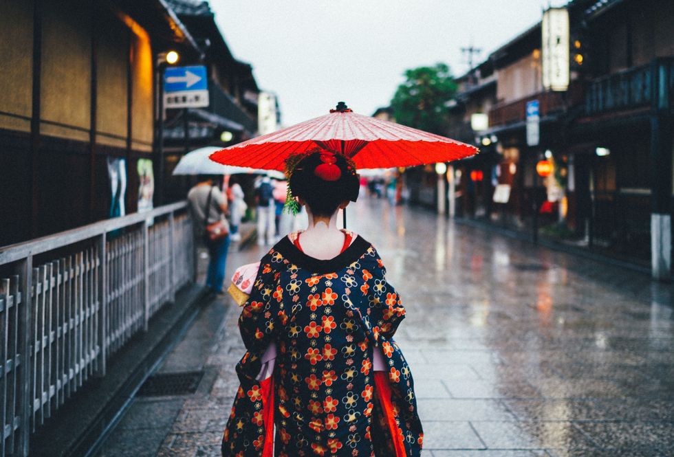 Umbrella, Red, Street fashion, Snapshot, Lighting, Street, Kimono, Architecture, Urban area, Infrastructure, 