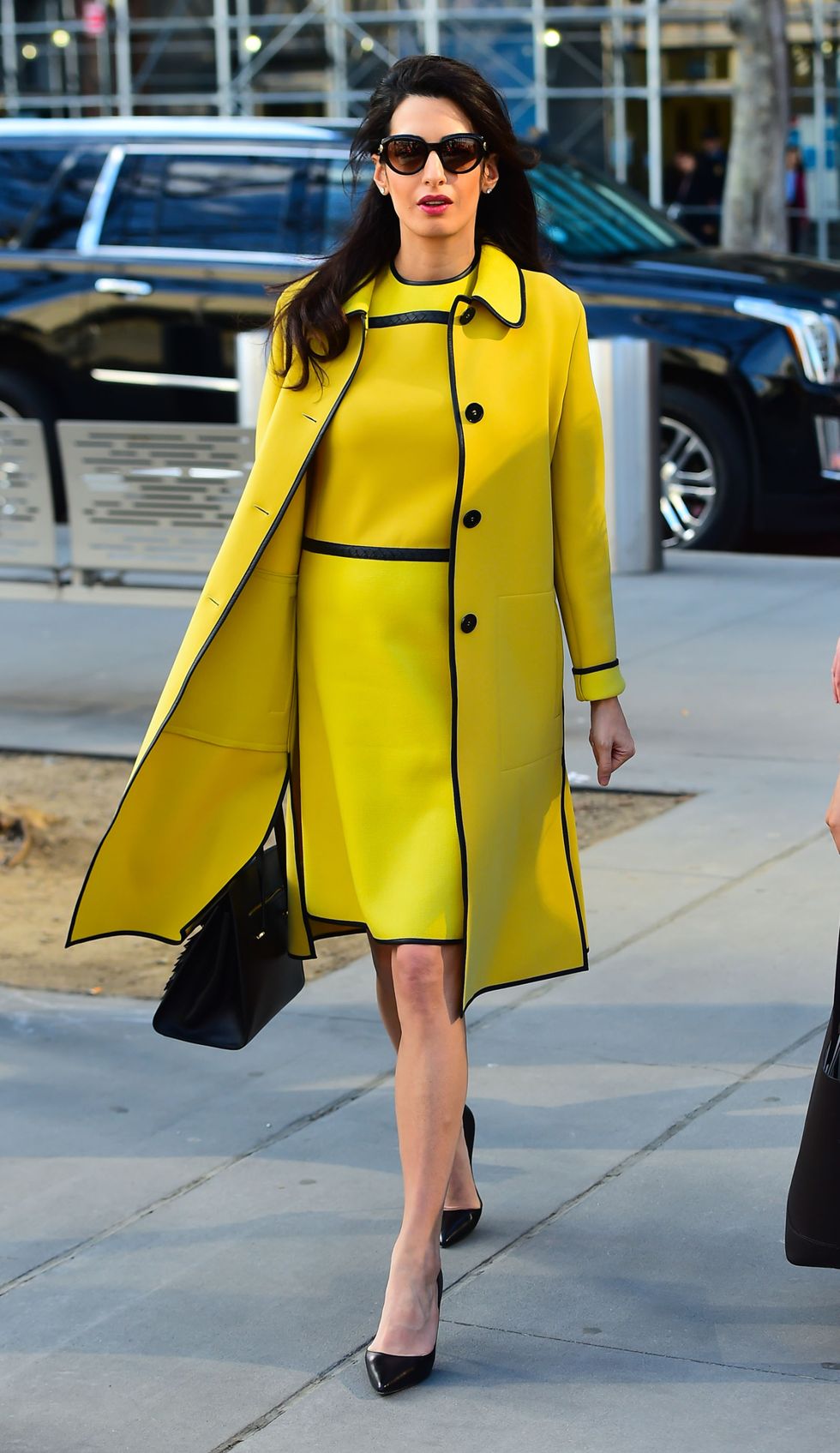 Clothing, Yellow, Street fashion, Fashion, Fashion model, Coat, Trench coat, Outerwear, Overcoat, Haute couture, 
