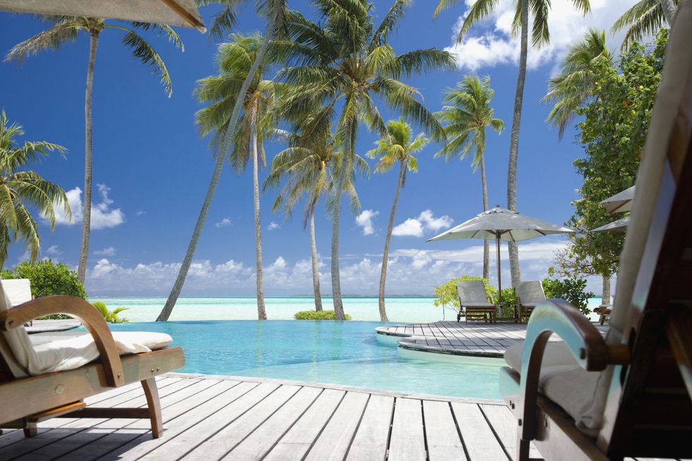 Resort, Property, Vacation, Caribbean, Tropics, Real estate, Tree, Palm tree, Ocean, Sky, 