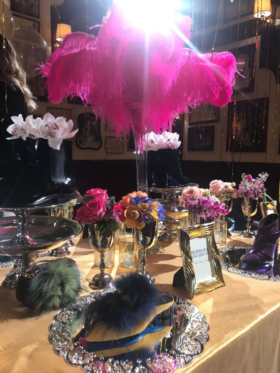 Centrepiece, Pink, Purple, Table, Flower, Artificial flower, Plant, Fashion accessory, Party, Display window, 