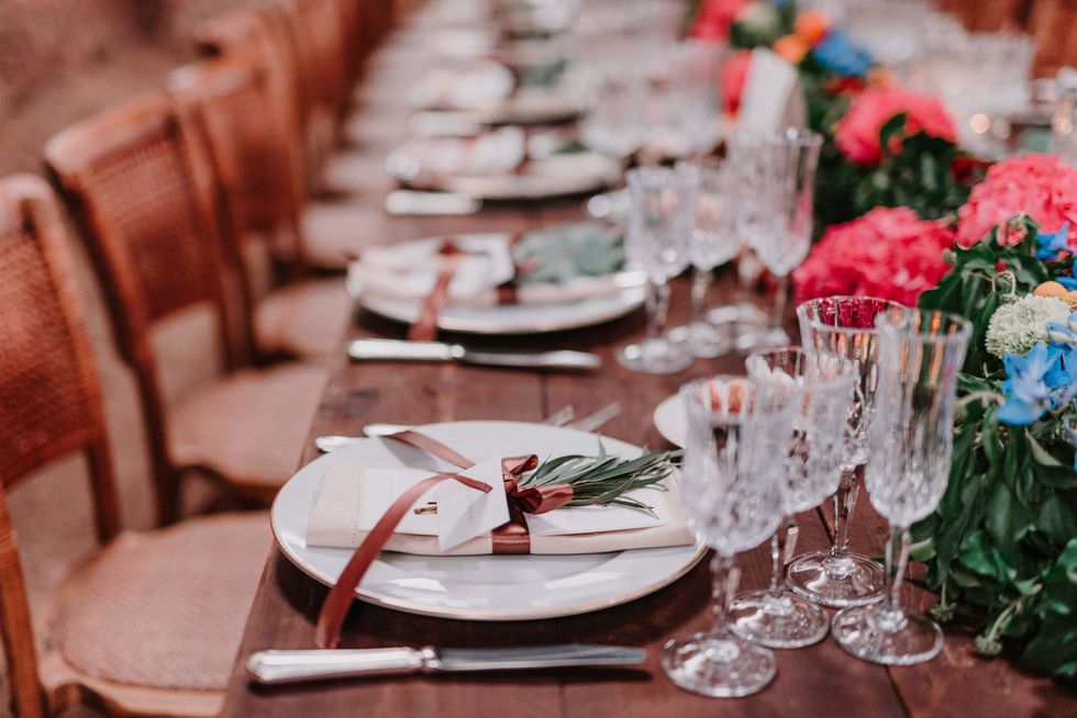 Photograph, Red, Rehearsal dinner, Wedding banquet, Champagne stemware, Turquoise, Tablecloth, Stemware, Table, Flower, 