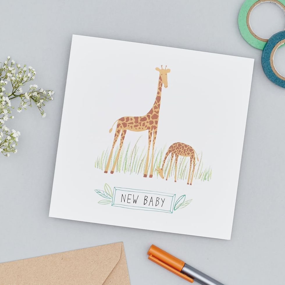 Giraffe, Giraffidae, Wildlife, Fawn, Font, Paper product, Greeting card, Illustration, Paper, Pattern, 