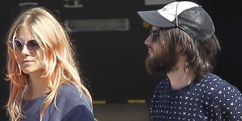 <p>Apparently, the stars trademark beach babe look didn't cut it for a romantic getaway with boyfriend Tom Sturridge to the party Island. So Sienna has added a pretty pink wash to her hair. With <a href="http://www.elleuk.com/news/beauty-news/green-with-e