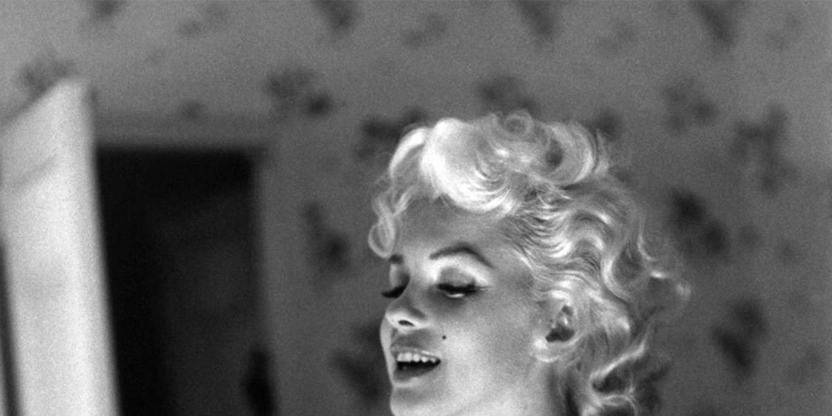 The Real Marilyn Monroe - Alexandra Plastino Mrs.Strick Isearch project  Final writing 8th 5/18/15 The Woman Behind the Blonde This is a person that  has