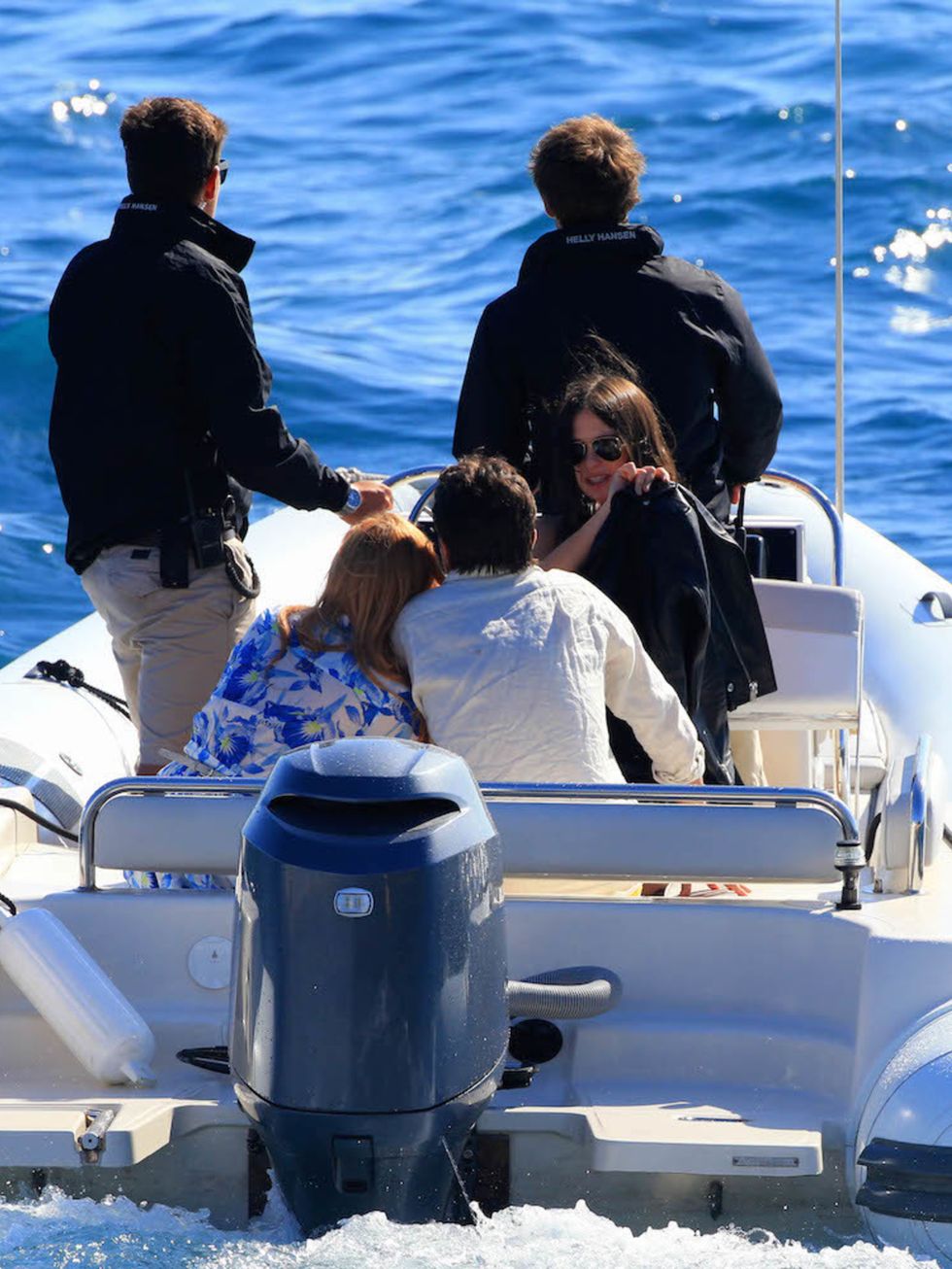 Lindsay Lohan goes yacht hopping in Cannes, looking loved up with her fiance Egor Tarabasov