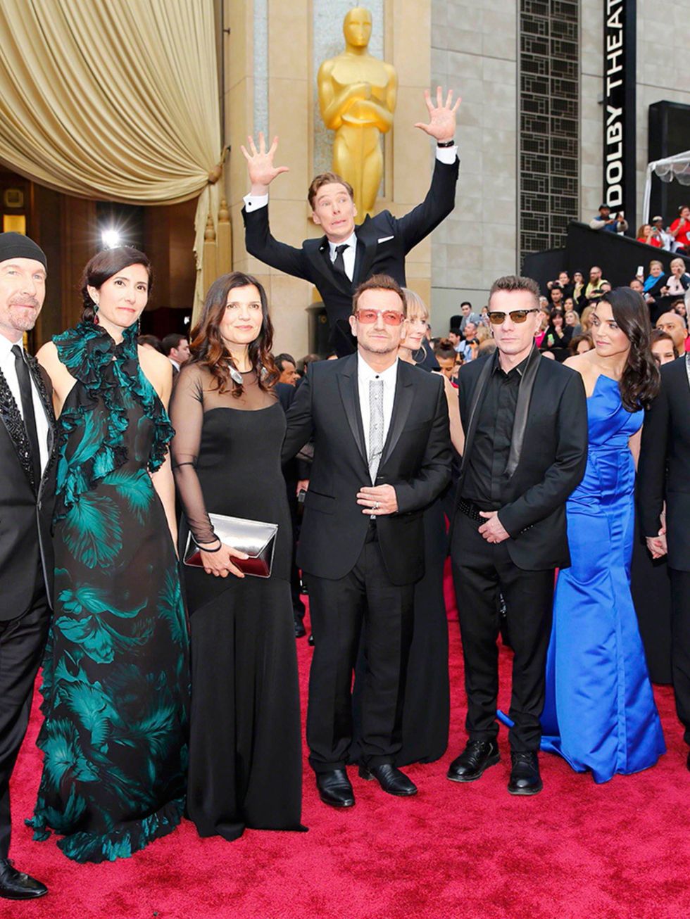 <p>Benedict Cumberbatch jumps up behind U2 at the 86th Academy Awards.</p>