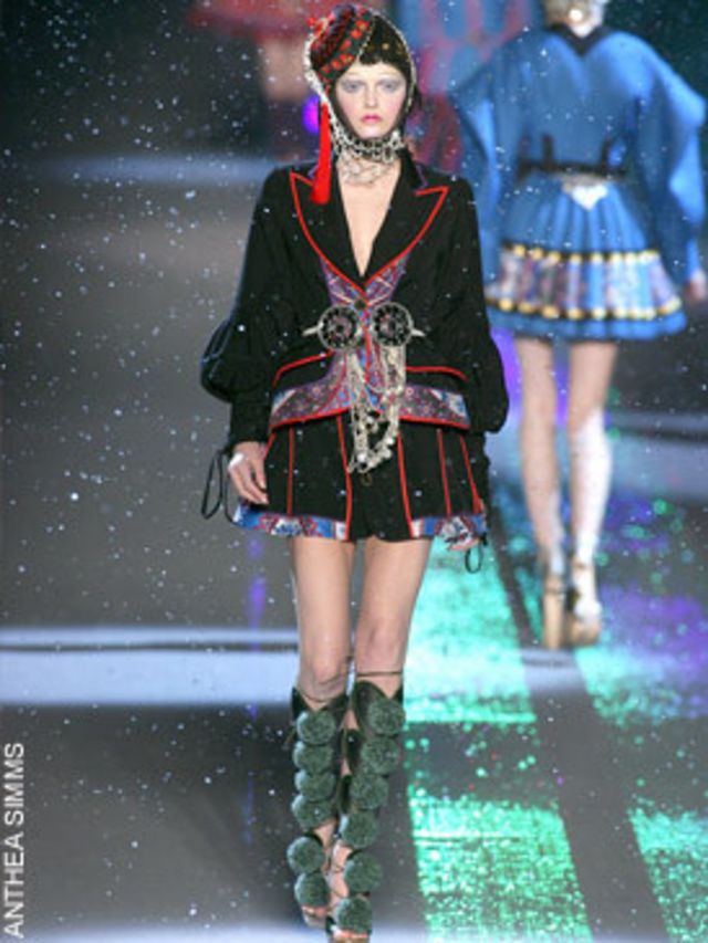 <p><a href="http://features.elleuk.com/fashion_week/127-5-John-Galliano-autumn-winter-2009.html">Click here to see the show</a></p><p>In a cold and barren warehouse, he seated his expectant crowd on hard wooden benches, and as the show started, snow began