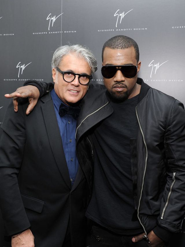 <p>Kanye West and Giuseppe Zanotti at Zanotti store opening in February</p>