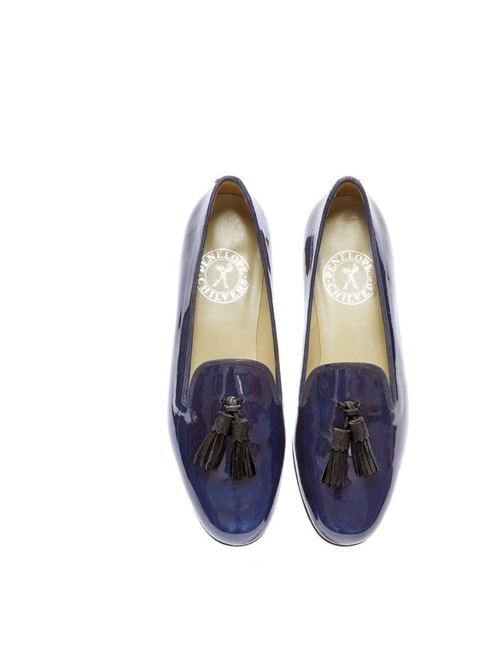 <p>Embrace the season of the flat shoe in these slick navy patent loafers; try them with a slightly cropped trouser for the office.</p><p><a href="http://www.penelopechilvers.com/products/details/i/1038-02040/n/dandy-tassel-slipper.aspx">Penelope Chilvers