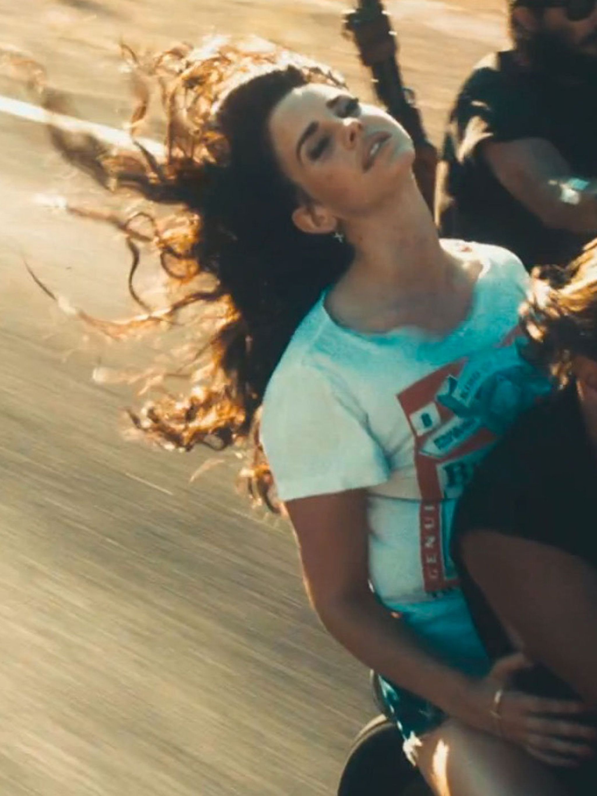 Lana Del Rey Debuts New Look By Swapping Beehive For Curls In Her New Video For Song Ride Elle Uk