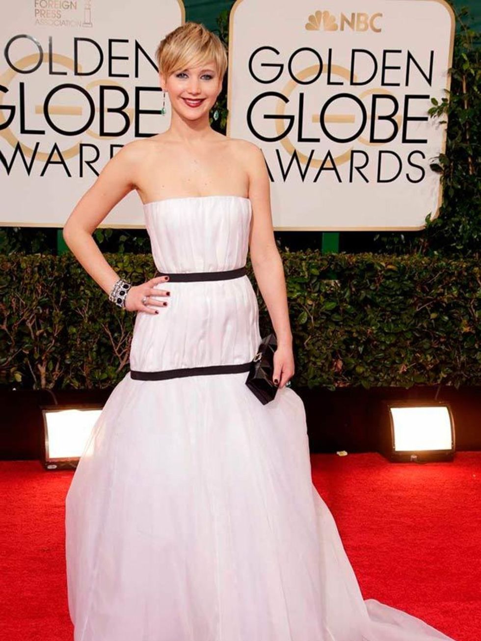 <p><a href="http://www.elleuk.com/star-style/celebrity-style-files/jennifer-lawrence">Jennifer Lawrence</a> wearing Dior is not exactly a surprise but this white strapless gown is pitch perfect in every way. Her cool attitude gives the dress a fresh, yout