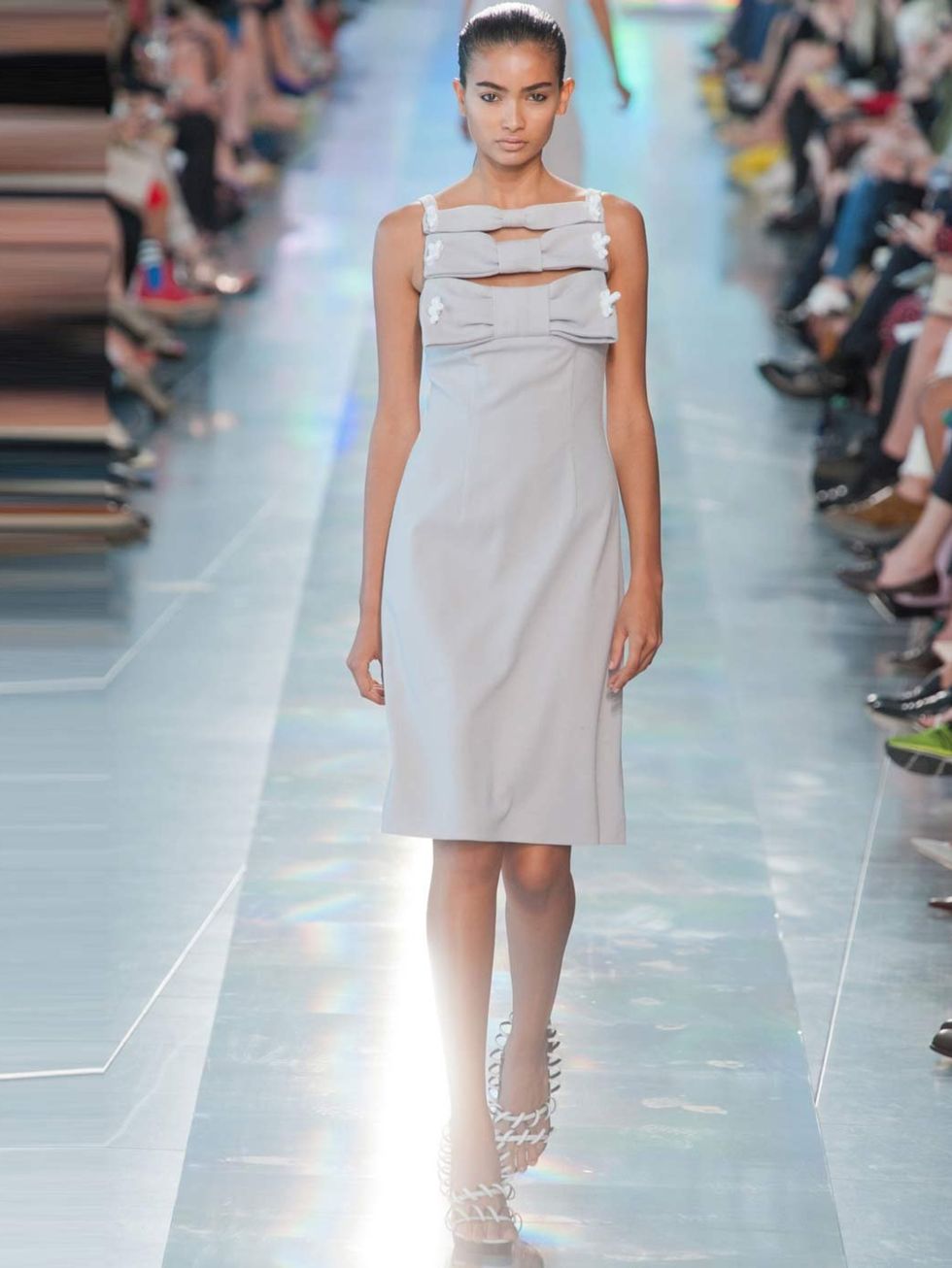 <p>'Dove grey is a beautiful colour on Kate. This edgy <a href="http://www.elleuk.com/catwalk/designer-a-z/christopher-kane/spring-summer-2013">Christopher Kane</a> dress could be toned down for the Duchess by removing the bolts, making it perfect for a B