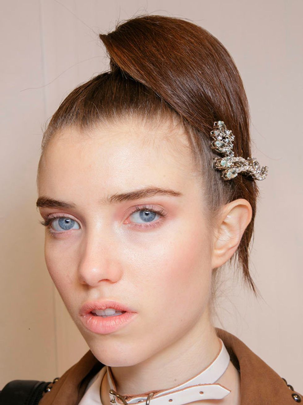 <p><a href="http://www.elleuk.com/catwalk/prada/autumn-winter-2015"><strong>Prada</strong></a></p>

<p>The look: Adorned updo</p>

<p>Hair stylist: <a href="http://www.elleuk.com/beauty/the-beauty-experts-you-need-to-know-charlotte-tilbury-backstage-beaut