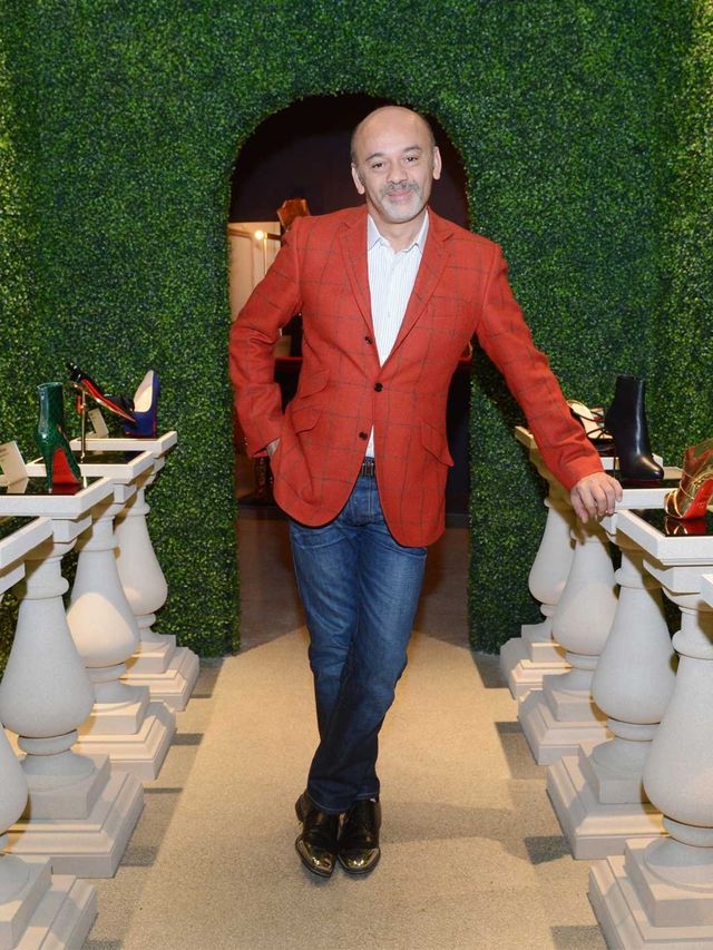 <p>Christian Louboutin in his Design Museum exhibition</p>