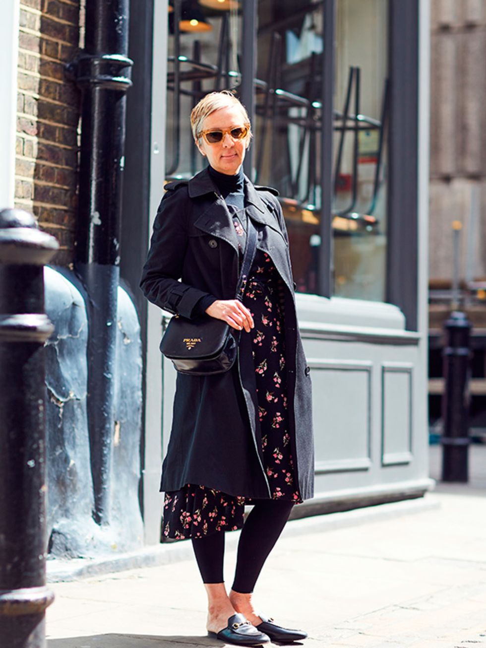 <p>Anne-Marie Curtis, Fashion Director</p>

<p>Saint Laurent coat, Prada dress, Wolford tights, Céline sunglasses, Prada bag, Gucci shoes</p>
