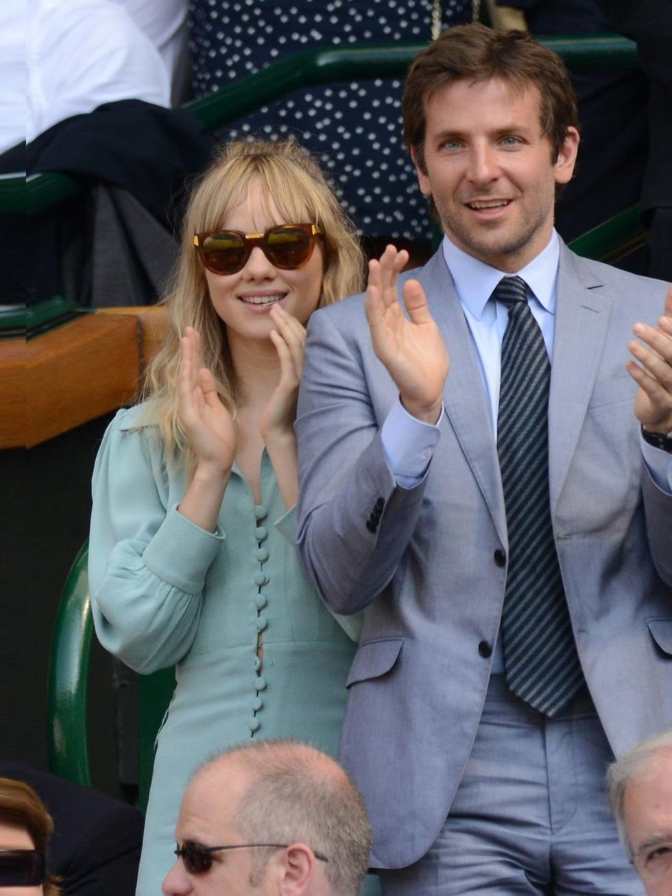 <p><a href="http://www.elleuk.com/elle-style-awards/news/bradley-cooper-best-actor-2013">Bradley Cooper</a> and Suki Waterhouse at the Men's Singles Final between Novak Djokovic and Andy Murray on Day 13 of Wimbledon, London, July 2013.</p>
