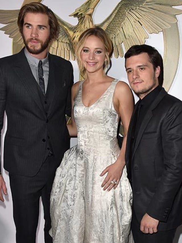 liam-hemsworth,-jennifer-lawrence-and-josh-hutcherson-hunger-games-premiere-november-2014-getty-thumb