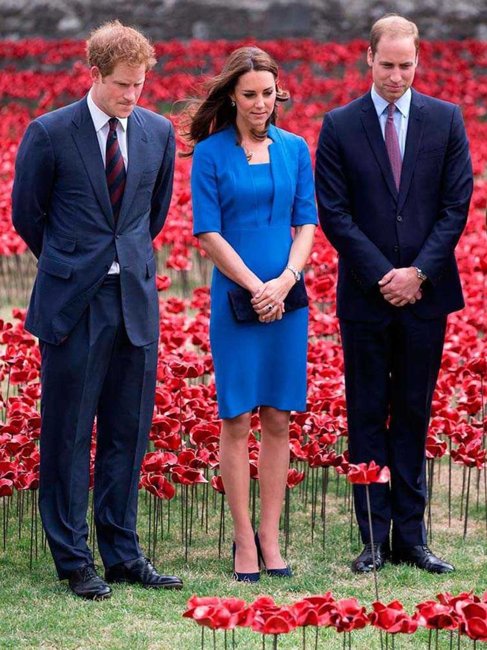 <p>Kate Middleton, with Princes William and Harry, wears L.K.Bennett at an installation entitled Blood Swept Lands and Seas of Red by artist Paul Cummins at the Tower of London to commemorate the First World War, August 2014.</p>