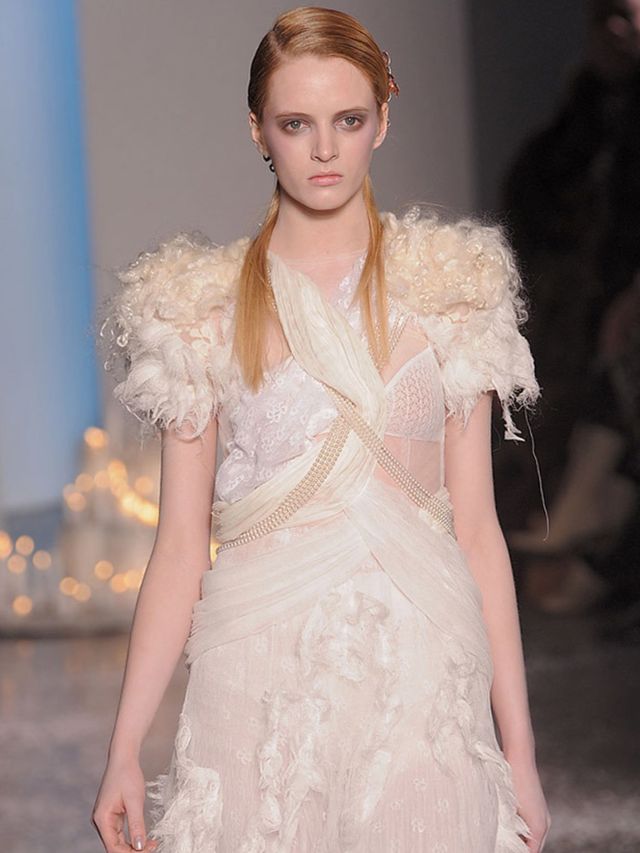 <p>And then white confetti was scattered all along the catwalk. It can often be difficult to read meaning into the Mulleavy sisters' abstract inspirations. But for their AW10 Rodarte show, the mood the designers invoked seemed much more straightforward. <