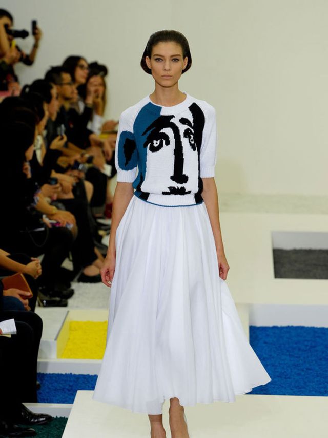 <p>The show space for the s/s 2012 collection was a minimalist white room, adorned only by square panels on the floor filled with gravel in primary shades - Modernism was the starting point for the collection. Shirt dresses were given a futuristic overhau