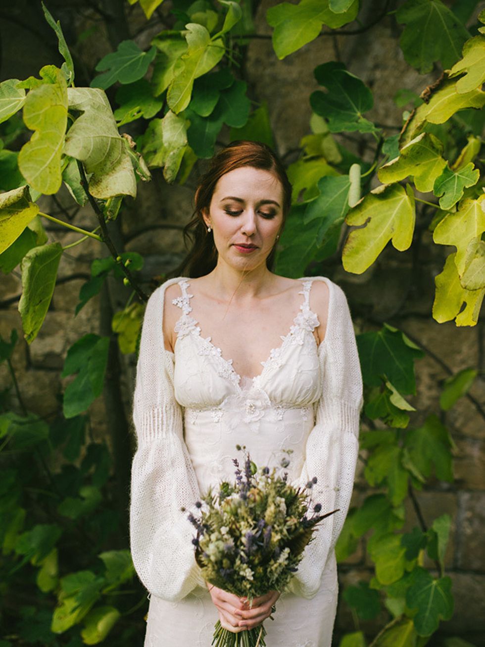 <p>My wedding dress was the 'Constance' by <a href="http://www.clairepettibone.com/" target="_blank">Claire Pettibone</a>. As soon as I started looking for dresses, I was immediately drawn to her boho and nature-inspired designs.</p>

<p>When I saw the 'C