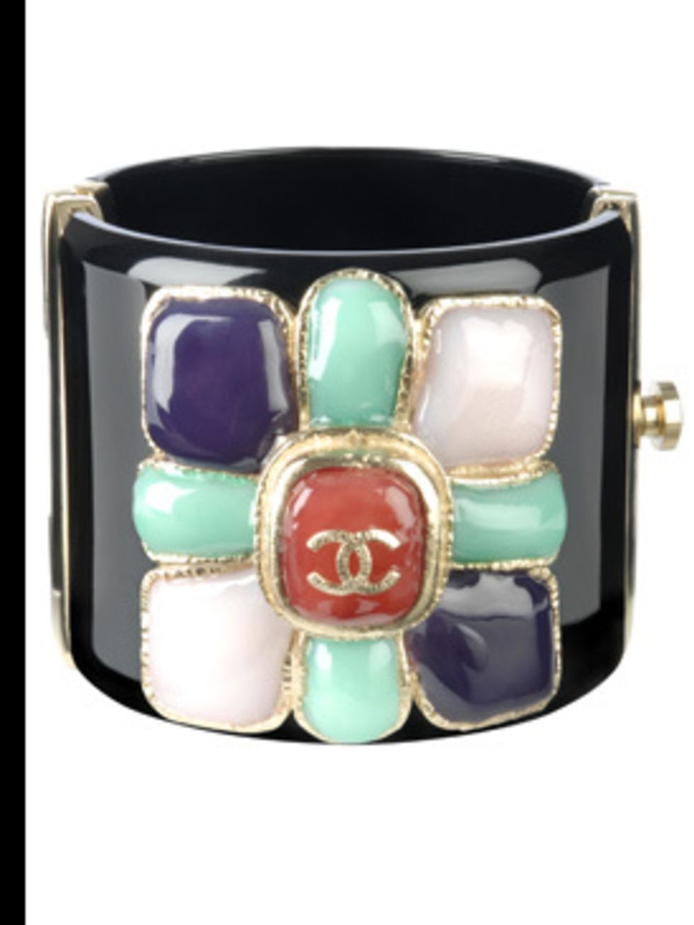 <p>Jewelled cuff £632 by Chanel, for stockists call 0207 493 5040</p>