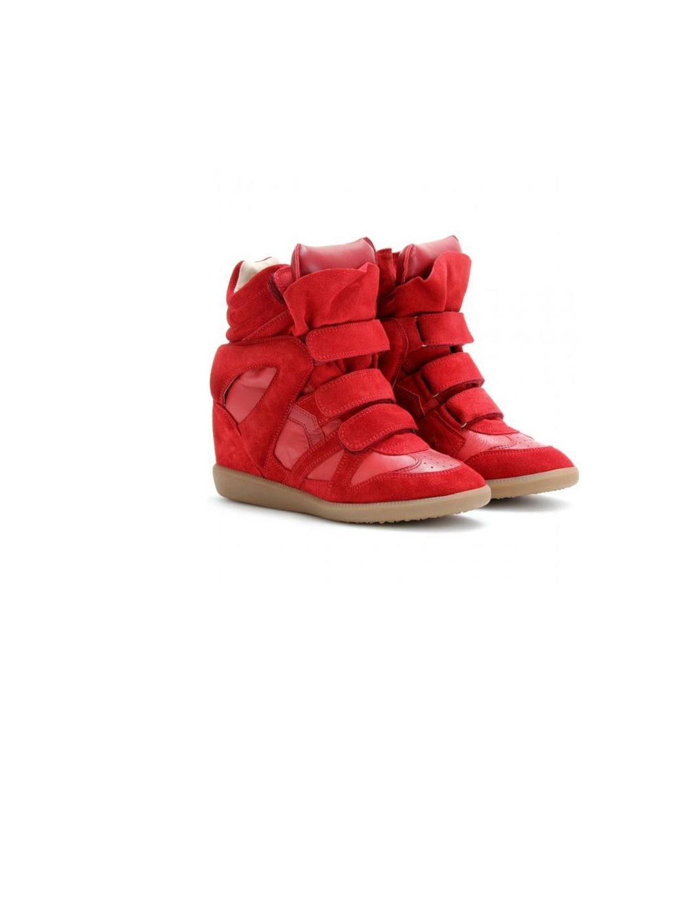 <p>Isabel Marant 'Bekett' wedge heel sneakers, £385, at <a href="http://www.mytheresa.com/uk_en/bekett-suede-wedge-sneakers-158514.html">mytheresa.com</a></p>