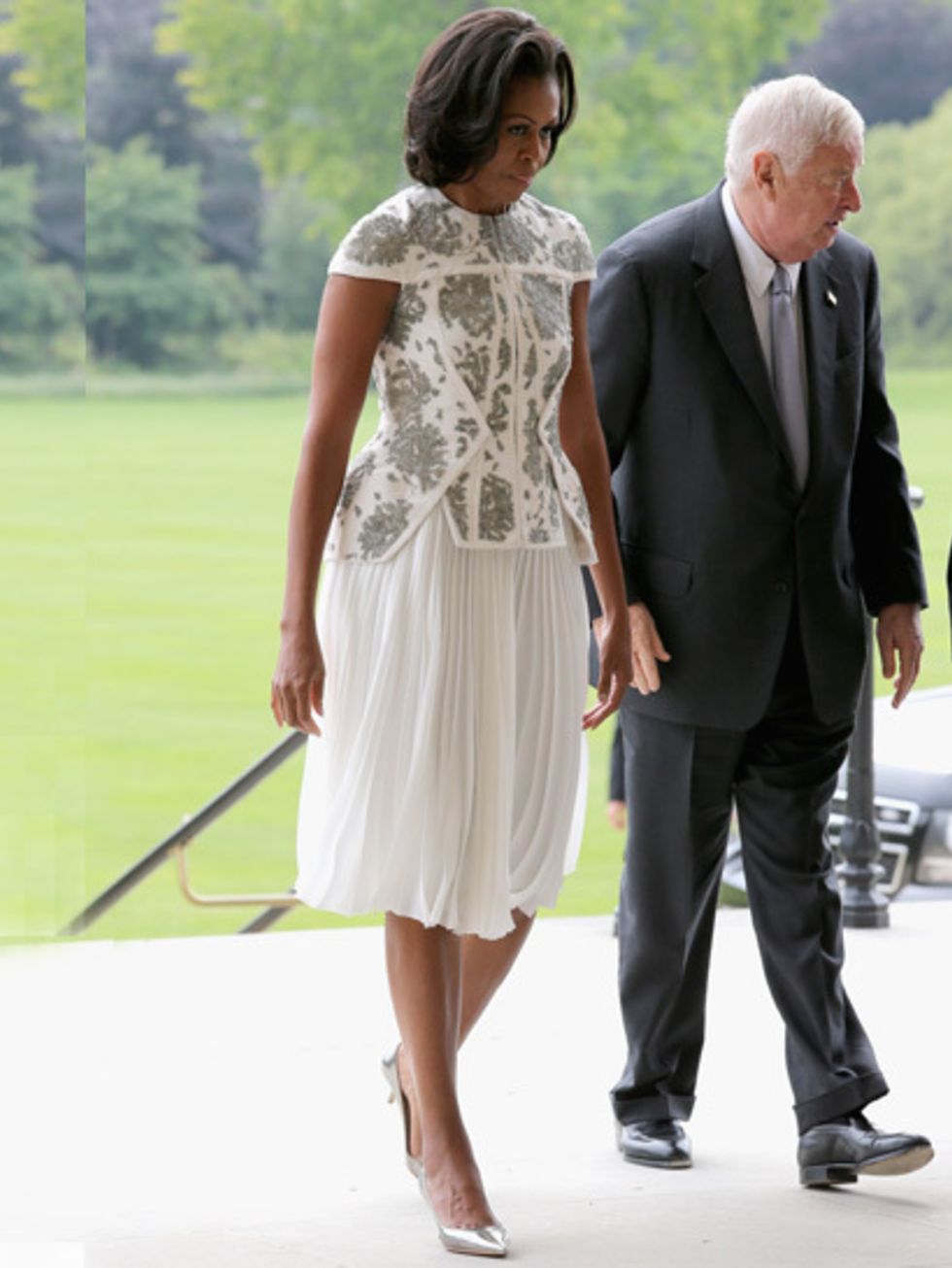 <p>Michelle Obama arrives at the Buckingham Palace reception wearing US designer J. Mendel Resort 2012 before the Opening Ceremony</p>