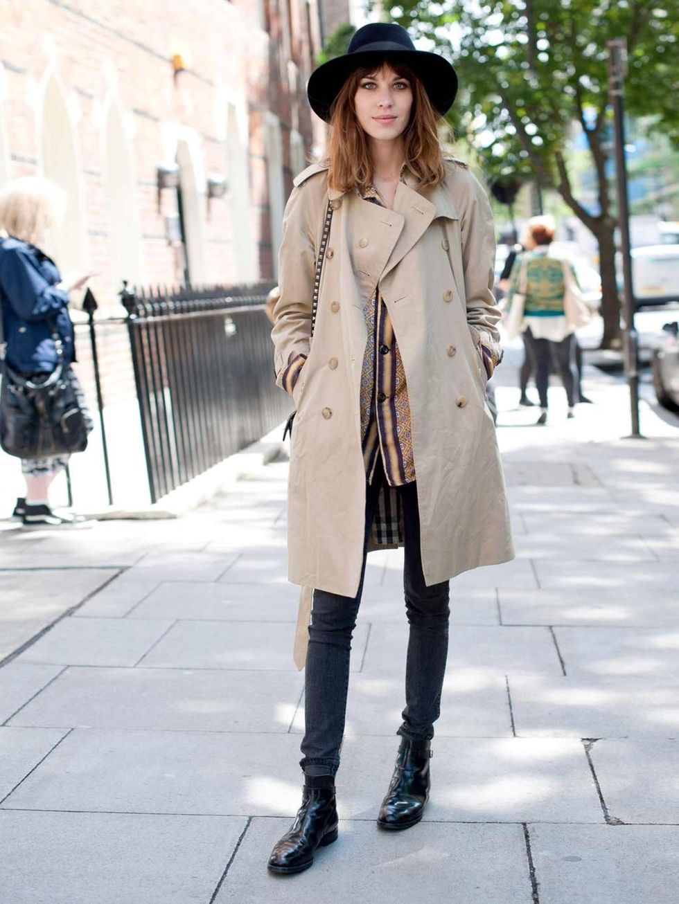 <p>Alexa Chung. Burberry coat, Valentino bag, Topman Design shirt, Churches boots, Lock &amp; Co hat.</p>