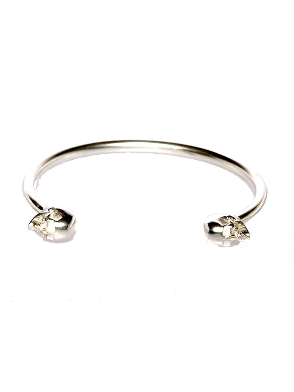 <p>Delicate silver details courtesy of <a href="http://www.kikiminchin.co.uk/shop" target="_blank">Kiki Minchin</a> make this bracelet complete your outfit, £175</p>