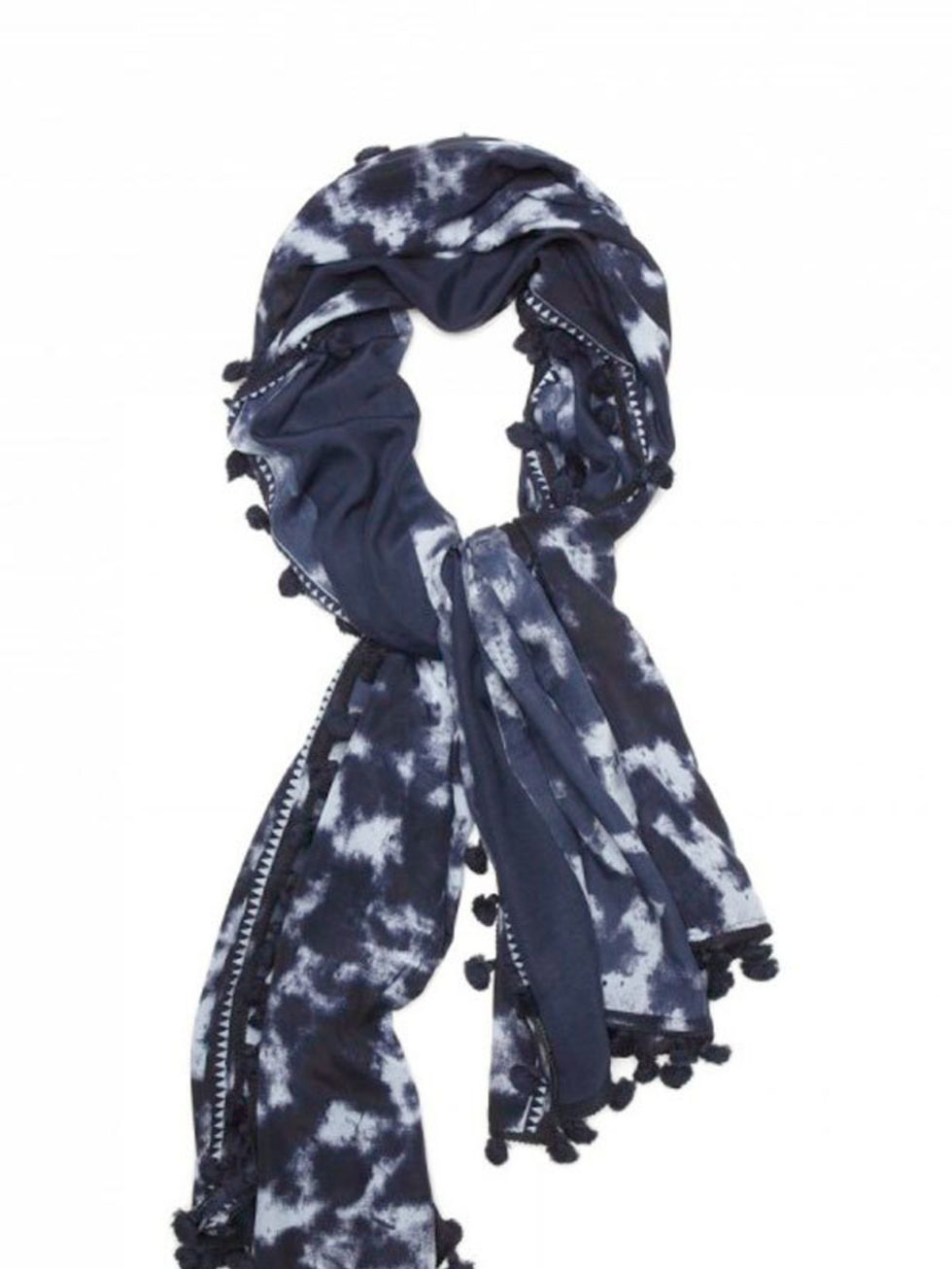 <p>Tie dye pom pom scarf, £45, by Banana Republic (0207 758 3550)</p>