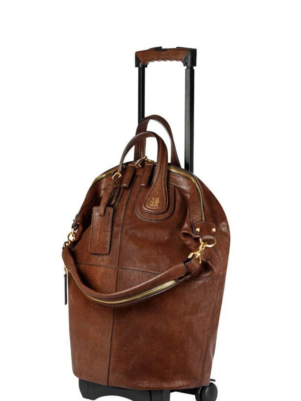 <p>Portable leather holdall, £1,899, by Givenchy at Selfridges (0800 123 400) </p>