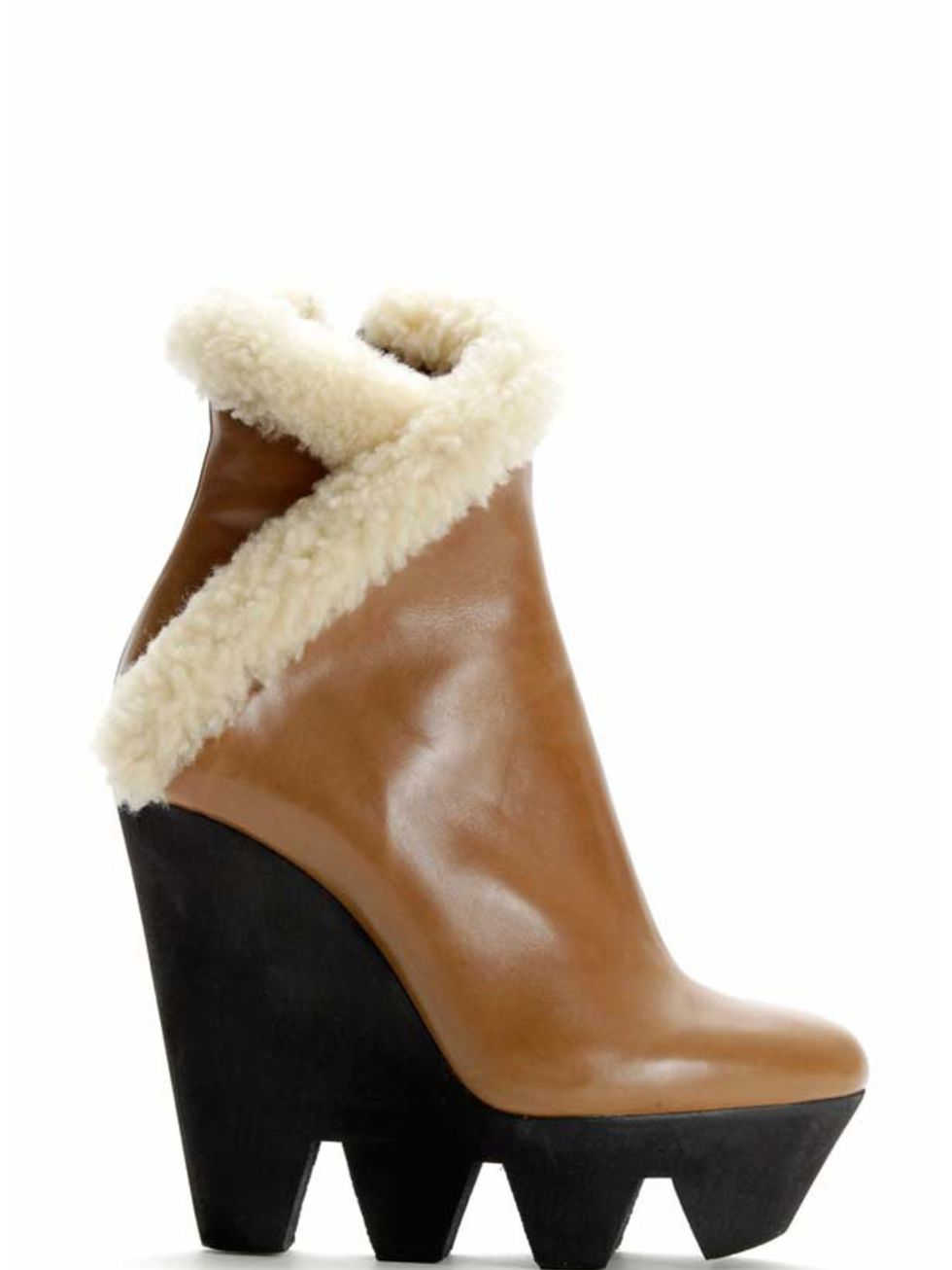 <p>Viktor &amp; Rolf shearling wedge boots, £500, at Selfridges for stockists call 0800 123 400</p>
