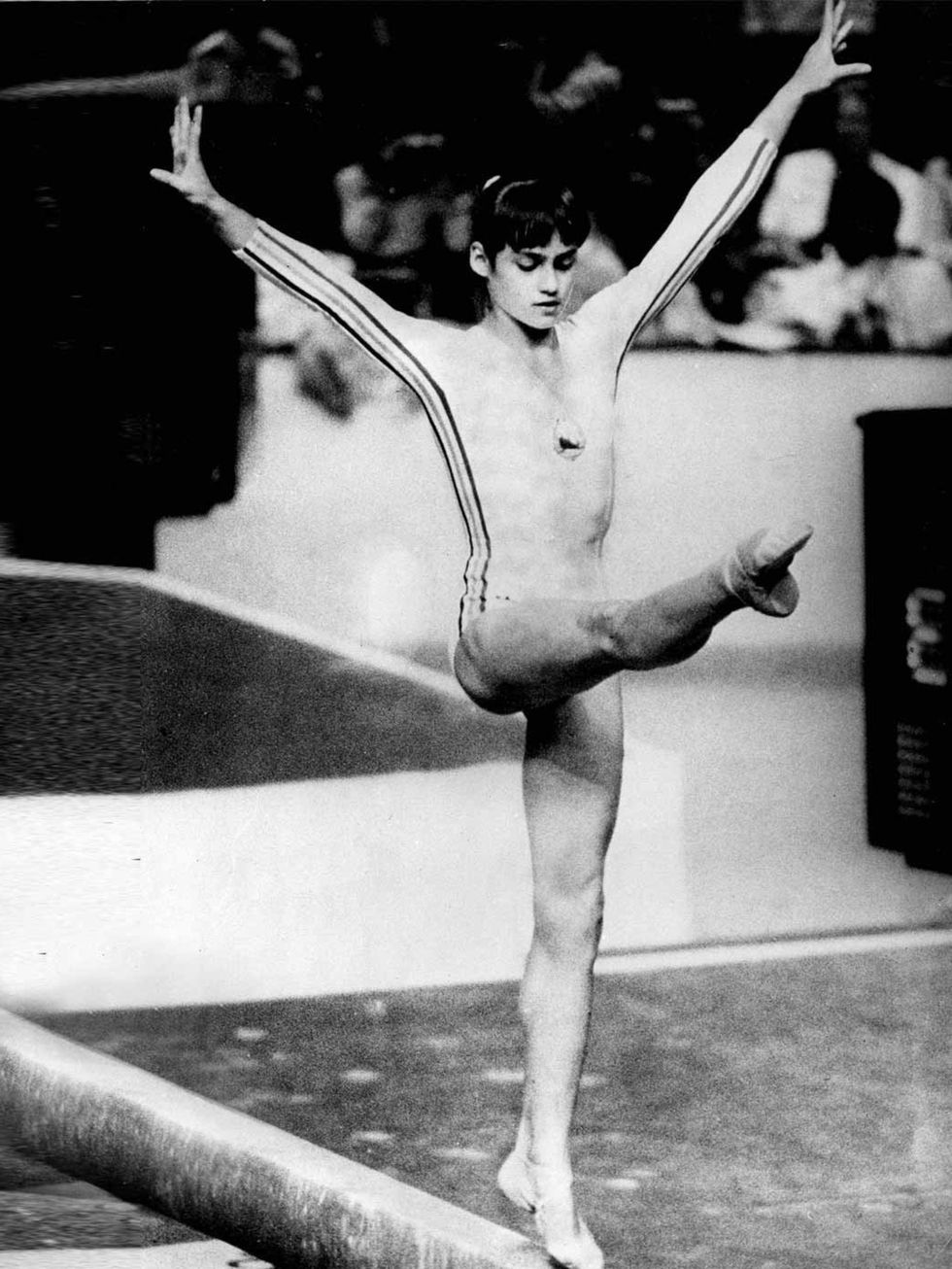 <p>Nadia Comaneci performing at the Olympics Games in Montreal, just before winning the gold medal, July 1976.</p>
