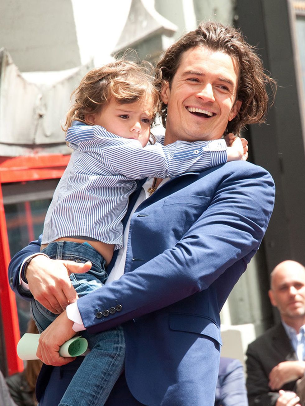 <p>Orlando Bloom with Flynn at The Hollywood Walk Of Fame ceremony honouring Orlando Bloom, April 2014.</p>
