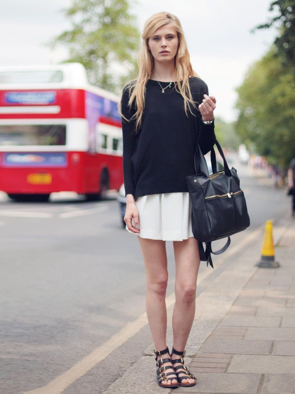 <p>Kimberley Ann Simmons is wearing Mango shorts, Topshop jumper and shoes, Whistles bag, Urban Outfitters necklace.</p>