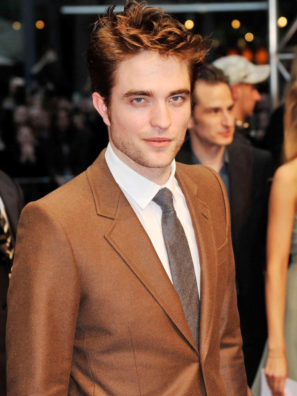 <p>Suited and shiny-haired at the<em> Water for Elephants</em> premiere, April 2011</p>