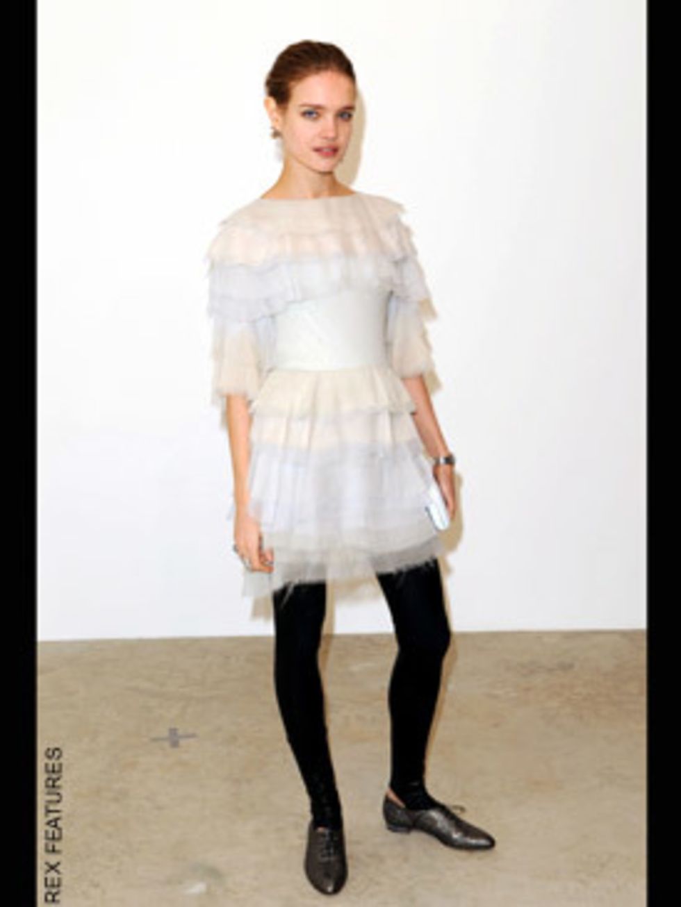 <p>In Chanel frill's and stirrup leggings at Chanel's Maison d'Art show in London</p>