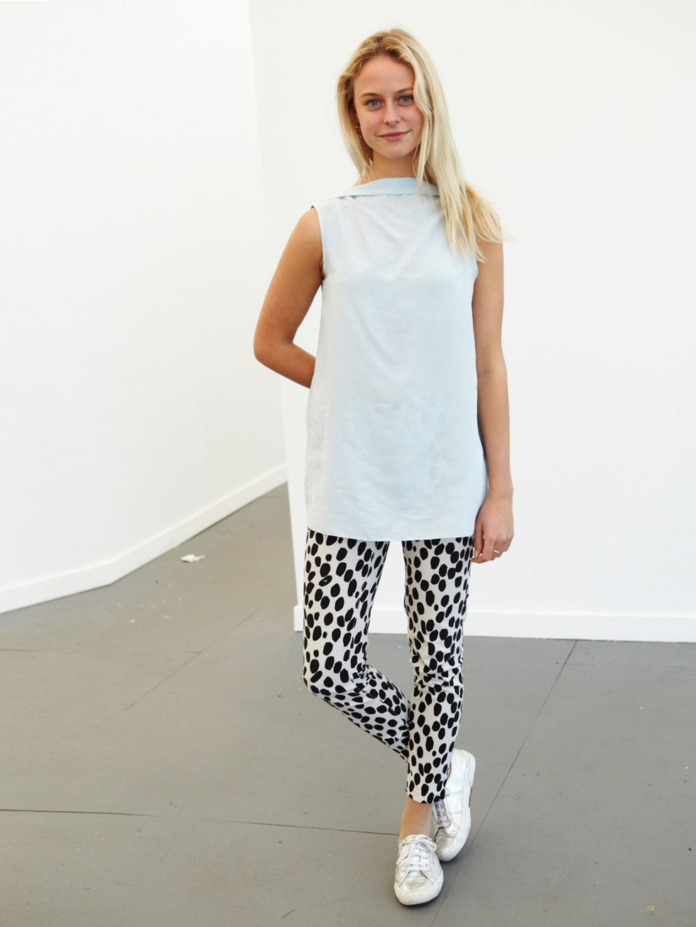 <p>Lizzy McGreggor wears Cos top, H&amp;M trousers, Superga shoes.</p>