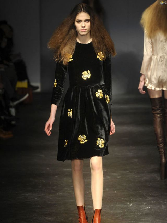 <p>She had her camera in hand and was snapping throughout the show, so we imagine that well see her sporting it before long.</p><p>The collection was classic Charles - rounded princess collars, loose fitting dresses with gently pleated skirts and towerin